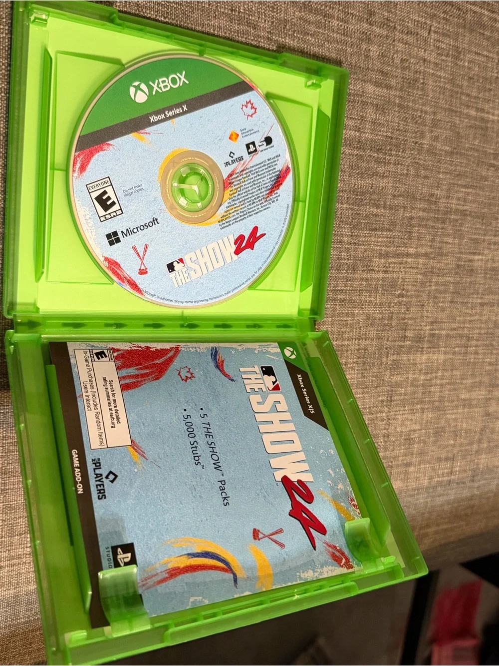 Microsoft Xbox Series X Game with Green Case and Blue Cover Art